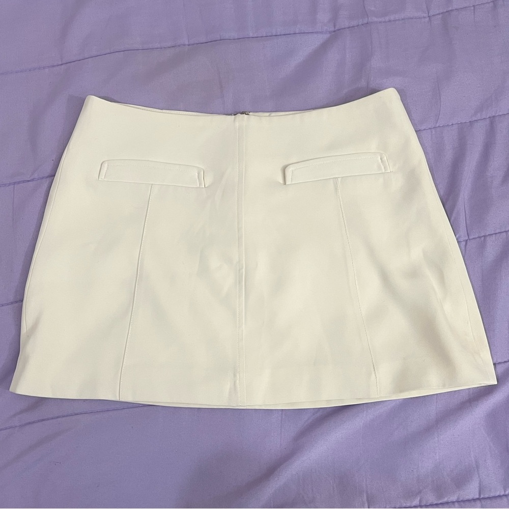white mini skirt